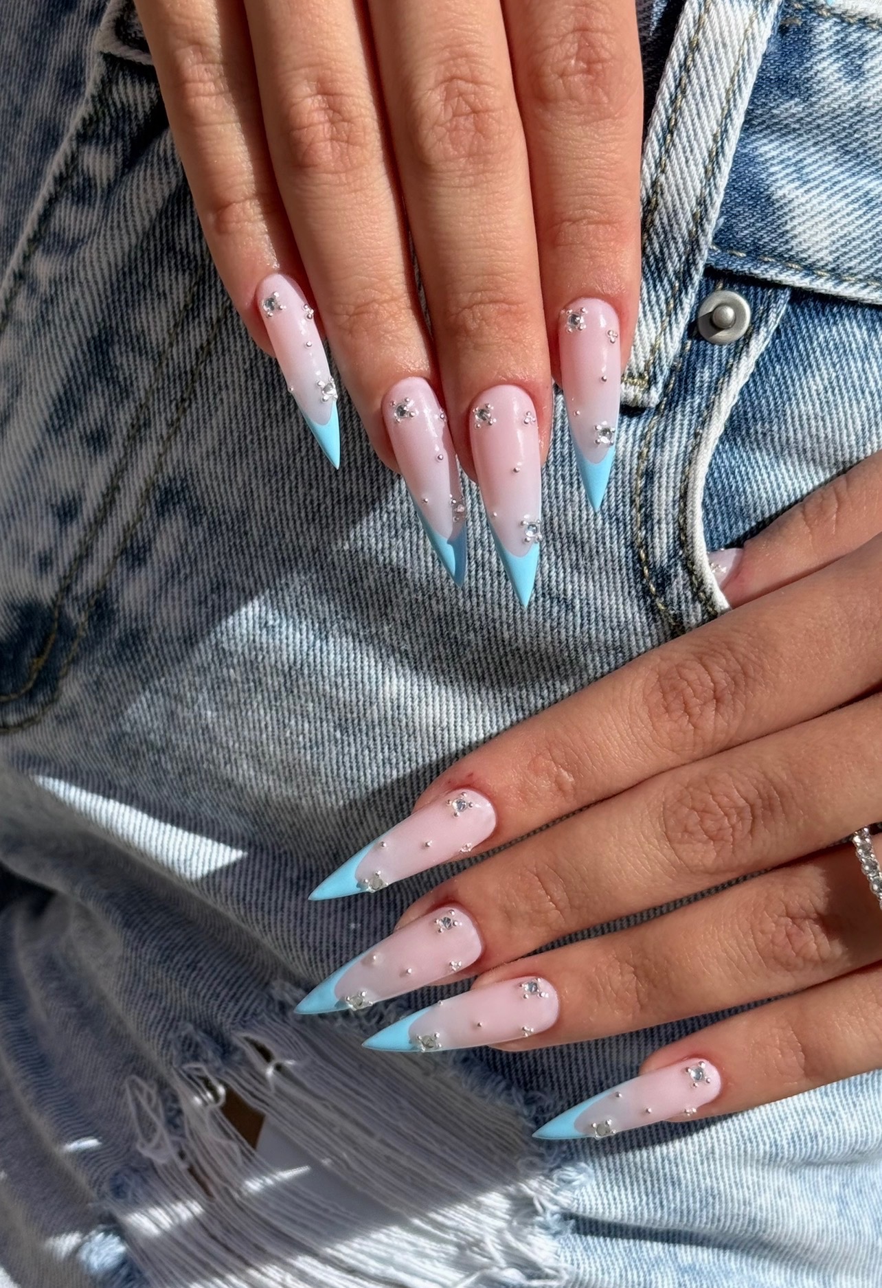 Baby blue French stiletto nails with rhinestones